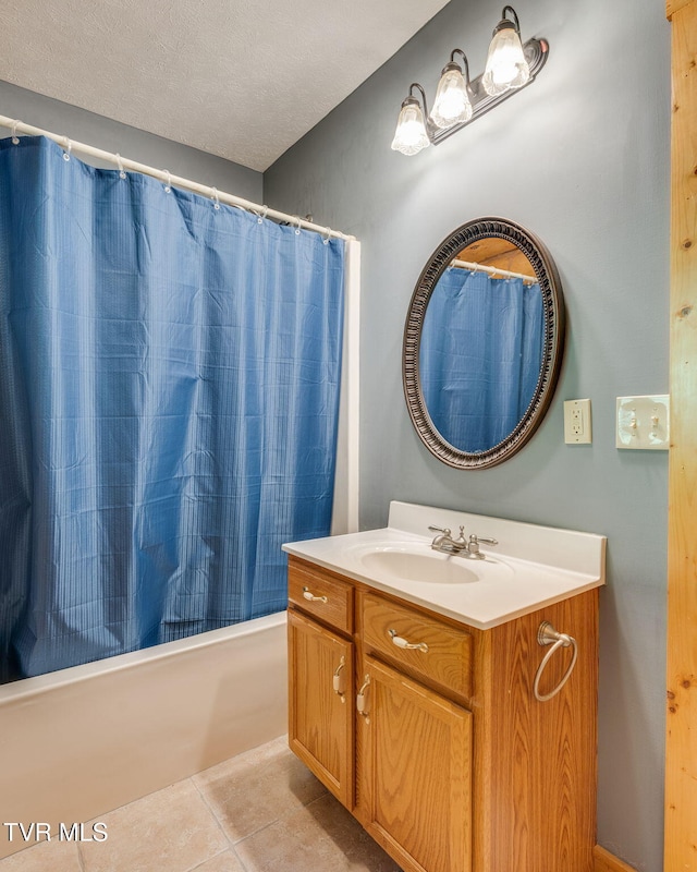 366 Judge Ben Allen Rd, Elizabethton, TN 37643 - bathroom with vanity, tile patterned flooring, shower / bath combo, and a textured ceiling