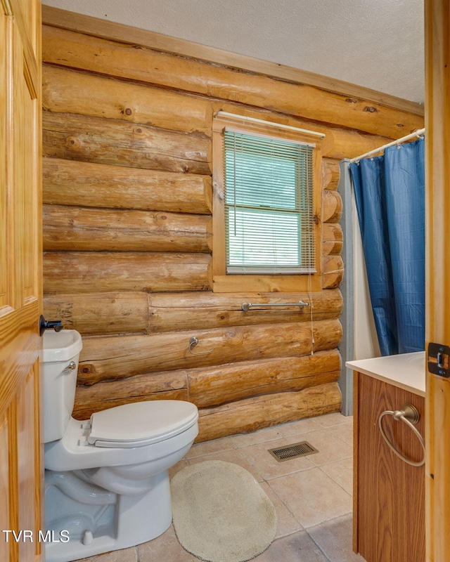 366 Judge Ben Allen Rd, Elizabethton, TN 37643 - full bath with toilet, log walls, a shower with curtain, tile patterned flooring, and vanity