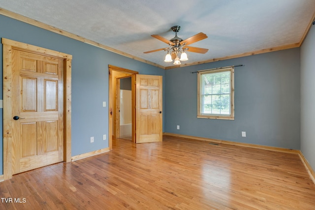 366 Judge Ben Allen Rd, Elizabethton, TN 37643 - unfurnished bedroom featuring baseboards, wood finished floors, crown molding, and a ceiling fan