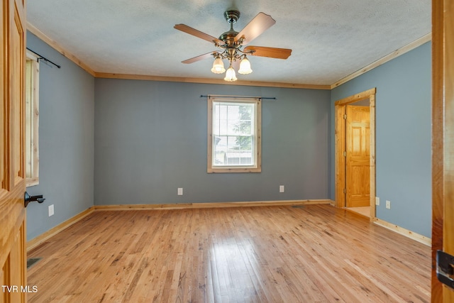 366 Judge Ben Allen Rd, Elizabethton, TN 37643 - unfurnished room with a textured ceiling, light wood-style floors, ornamental molding, a ceiling fan, and baseboards