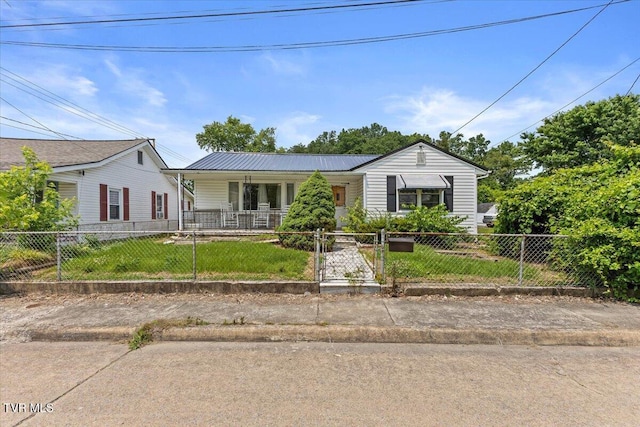 204 E Millpond St, Kingsport, TN 37660 - view of front of property featuring covered porch, metal roof, and a gate