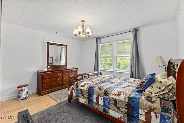 204 E Millpond St, Kingsport, TN 37660 - bedroom with a chandelier and wood finished floors