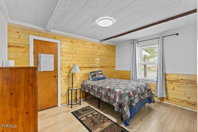 204 E Millpond St, Kingsport, TN 37660 - bedroom with wood walls, wood finished floors, crown molding, and beam ceiling