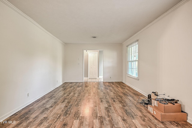 112 Hillview Rd, Kingsport, TN 37664 - spare room featuring wood finished floors and crown molding