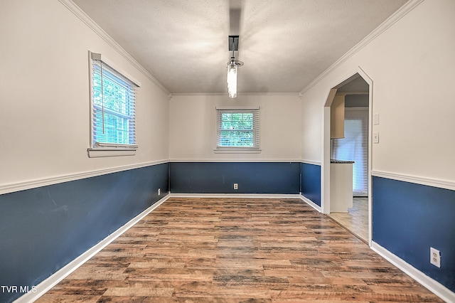 112 Hillview Rd, Kingsport, TN 37664 - unfurnished room with wood finished floors, crown molding, and arched walkways