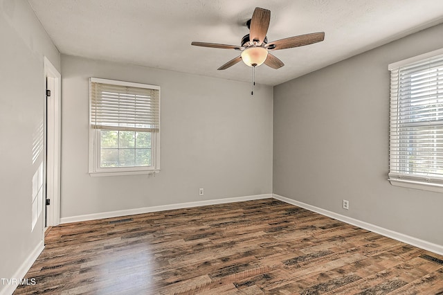 112 Hillview Rd, Kingsport, TN 37664 - unfurnished room with healthy amount of natural light, dark wood finished floors, and ceiling fan