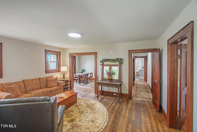 740 Fishpond Rd, Chuckey, TN 37641 - living room featuring wood finished floors and baseboards