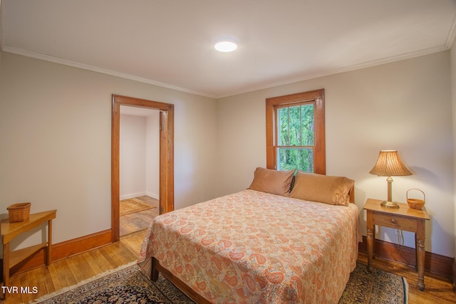 740 Fishpond Rd, Chuckey, TN 37641 - bedroom featuring light wood-style floors and ornamental molding