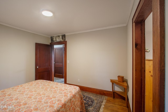 740 Fishpond Rd, Chuckey, TN 37641 - bedroom featuring wood finished floors and ornamental molding