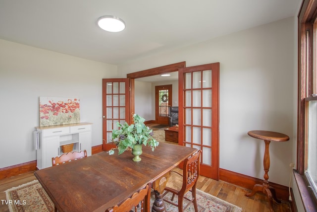 740 Fishpond Rd, Chuckey, TN 37641 - dining room featuring french doors and light wood-style floors