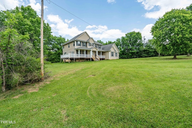 2898 Watauga Rd, Johnson City, TN 37601 - back of property with a lawn and a wooden deck