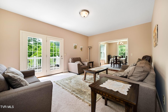 2898 Watauga Rd, Johnson City, TN 37601 - living area with a chandelier, plenty of natural light, and carpet floors