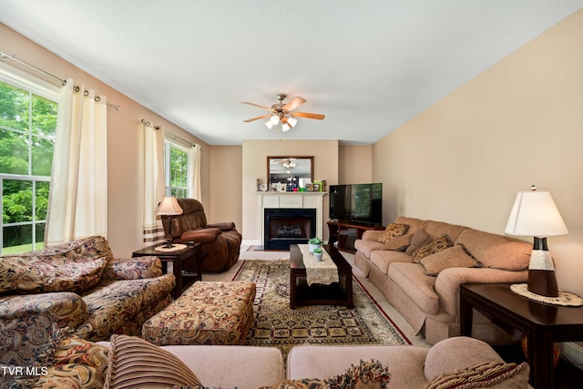 2898 Watauga Rd, Johnson City, TN 37601 - living area featuring a ceiling fan and a fireplace with flush hearth