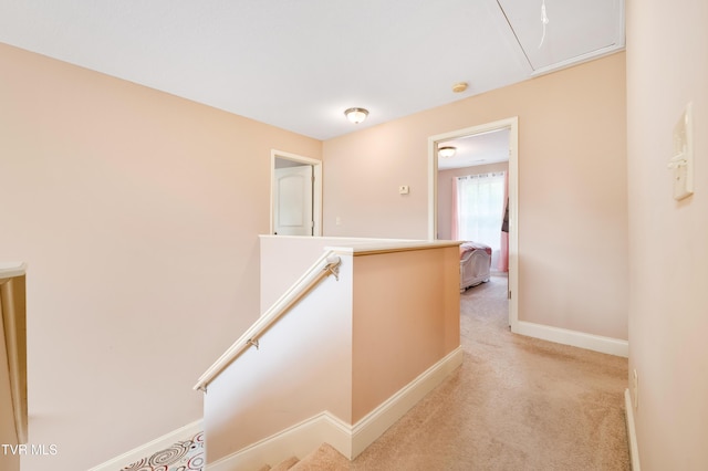 2898 Watauga Rd, Johnson City, TN 37601 - hallway with an upstairs landing, baseboards, light colored carpet, and attic access