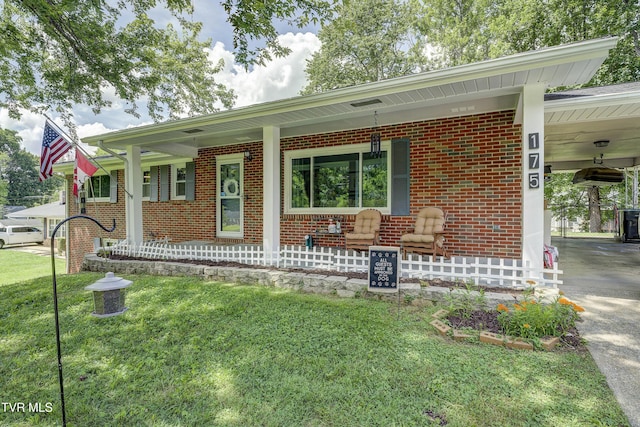 175 Shenandoah Dr, Johnson City, TN 37601 - ranch-style home featuring covered porch, concrete driveway, brick siding, and an attached carport