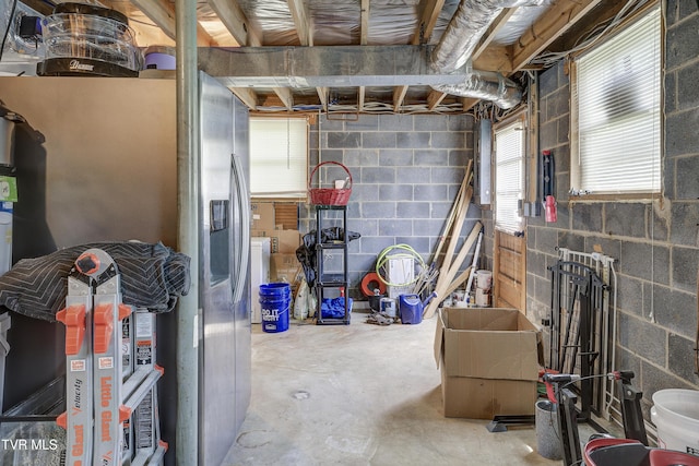 175 Shenandoah Dr, Johnson City, TN 37601 - below grade area with stainless steel fridge and concrete block wall