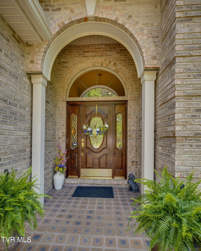 100 Pointe Dr, Piney Flats, TN 37686 - view of exterior entry featuring brick siding