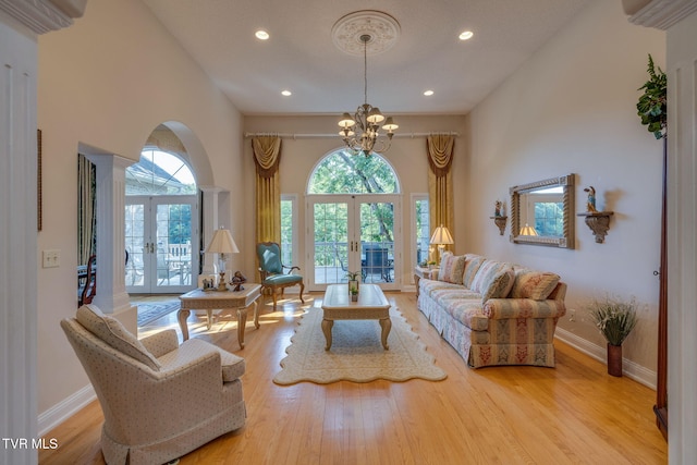 100 Pointe Dr, Piney Flats, TN 37686 - living room with french doors, a chandelier, recessed lighting, baseboards, and a towering ceiling