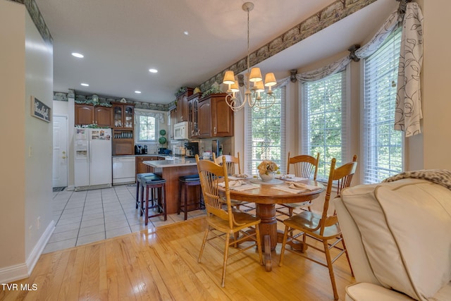 100 Pointe Dr, Piney Flats, TN 37686 - dining area with a chandelier, light wood finished floors, recessed lighting, and baseboards