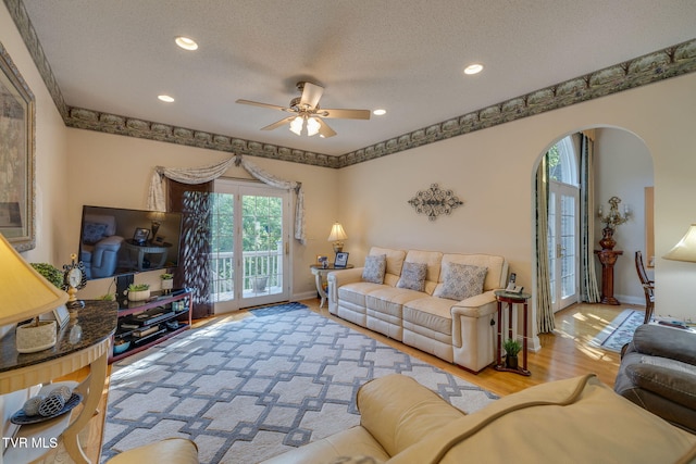 100 Pointe Dr, Piney Flats, TN 37686 - living room featuring arched walkways, a textured ceiling, ceiling fan, baseboards, and recessed lighting