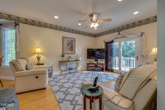 100 Pointe Dr, Piney Flats, TN 37686 - living room featuring baseboards, ceiling fan, wood finished floors, recessed lighting, and a textured ceiling