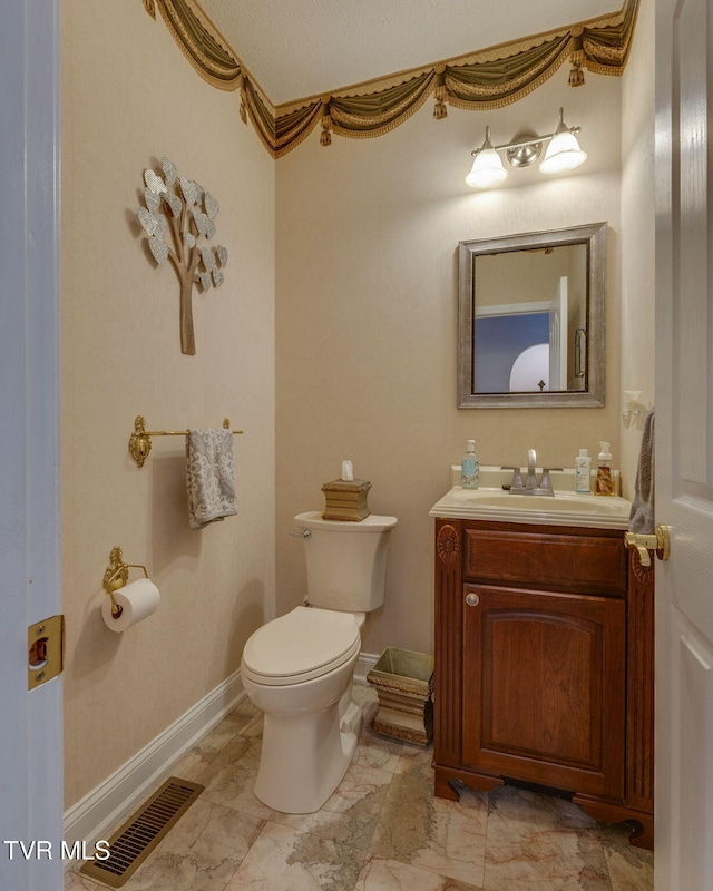 100 Pointe Dr, Piney Flats, TN 37686 - half bathroom with vanity, toilet, and marble finish flooring