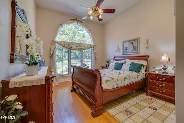 100 Pointe Dr, Piney Flats, TN 37686 - bedroom with multiple windows, light wood-style floors, and a ceiling fan