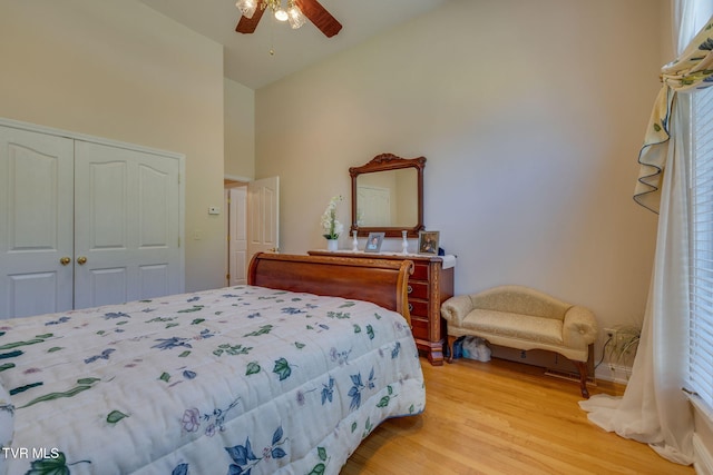 100 Pointe Dr, Piney Flats, TN 37686 - bedroom with light wood-type flooring, high vaulted ceiling, a closet, baseboards, and a ceiling fan
