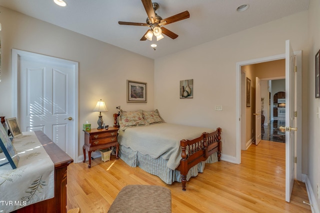 100 Pointe Dr, Piney Flats, TN 37686 - bedroom featuring light wood-type flooring, baseboards, arched walkways, recessed lighting, and a ceiling fan