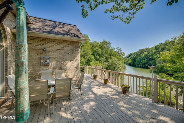 100 Pointe Dr, Piney Flats, TN 37686 - wooden deck with a water view and outdoor dining space