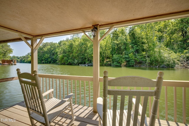 100 Pointe Dr, Piney Flats, TN 37686 - wooden deck featuring a water view and view of wooded area