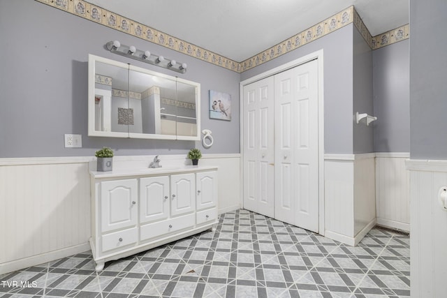 2012 Euclid Ave, Bristol, VA 24201 - bathroom with wainscoting and vanity