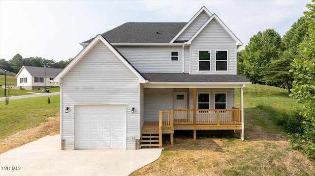 215 Brighton Pl, Bristol, TN 37620 - traditional home with a garage, a front lawn, covered porch, and driveway