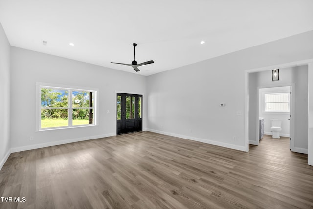 1930 Erwin Hwy, Greeneville, TN 37745 - unfurnished living room featuring a ceiling fan, wood finished floors, and recessed lighting