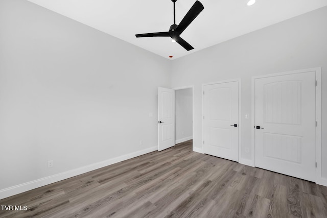 1930 Erwin Hwy, Greeneville, TN 37745 - unfurnished bedroom with wood finished floors, ceiling fan, and recessed lighting