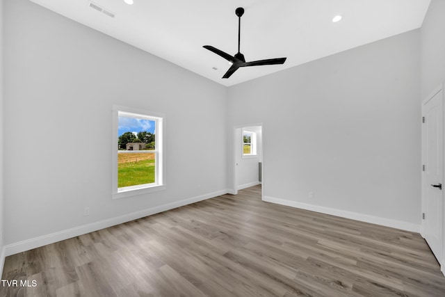 1930 Erwin Hwy, Greeneville, TN 37745 - spare room with a ceiling fan, high vaulted ceiling, wood finished floors, and recessed lighting