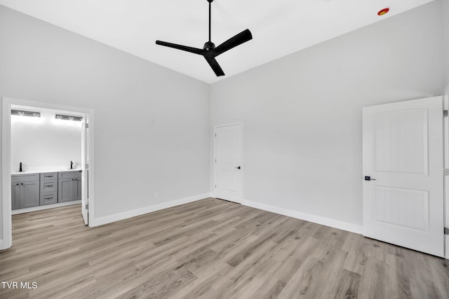 1930 Erwin Hwy, Greeneville, TN 37745 - spare room with a ceiling fan, light wood finished floors, and high vaulted ceiling