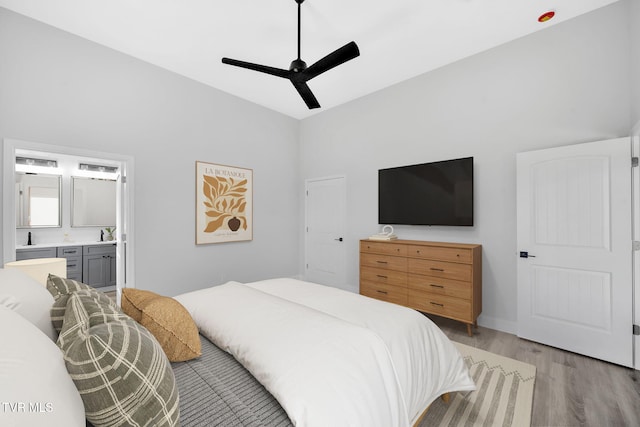 1930 Erwin Hwy, Greeneville, TN 37745 - bedroom featuring light wood-style flooring, ensuite bathroom, and ceiling fan