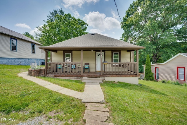 645 Suffolk Ave, Bristol, VA 24201 - bungalow-style home featuring covered porch, a front yard, and a shingled roof