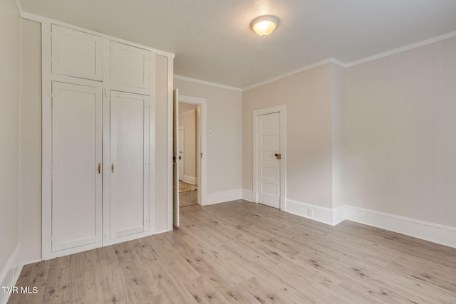 645 Suffolk Ave, Bristol, VA 24201 - unfurnished bedroom featuring light wood-style flooring, crown molding, and baseboards
