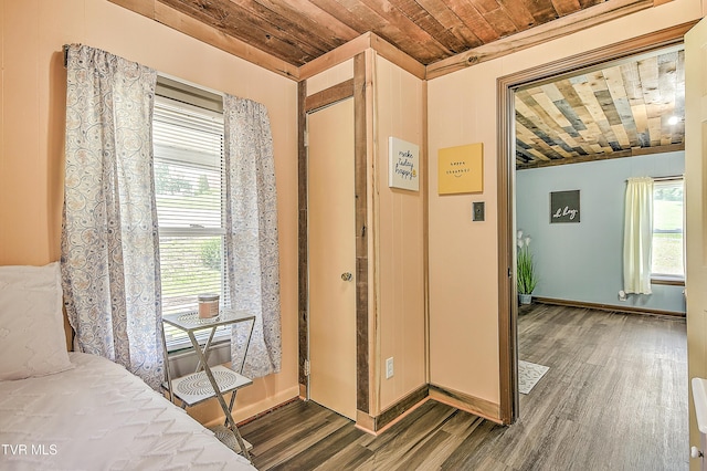 165 Hughes St, Bristol, VA 24201 - entrance foyer with wood ceiling, wood finished floors, and baseboards