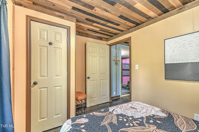 165 Hughes St, Bristol, VA 24201 - bedroom with wood ceiling and wood finished floors