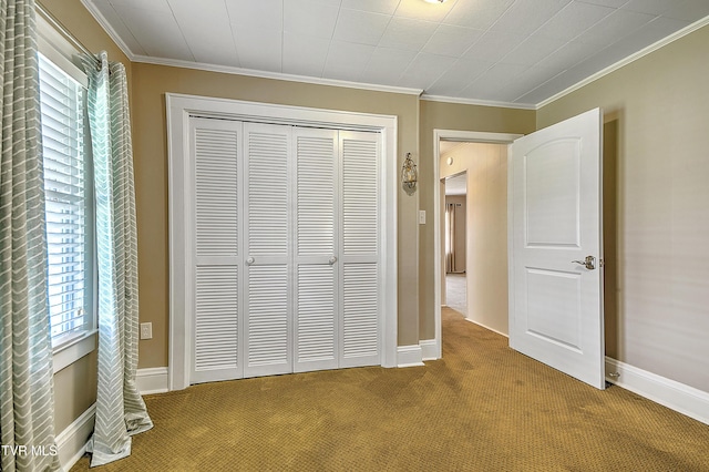 1241 Carolina Ave, Bristol, TN 37620 - unfurnished bedroom featuring carpet floors, a closet, ornamental molding, and baseboards