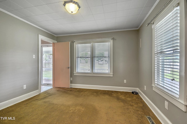 1241 Carolina Ave, Bristol, TN 37620 - carpeted empty room featuring healthy amount of natural light, ornamental molding, and baseboards