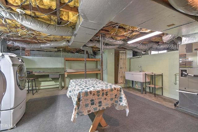 1241 Carolina Ave, Bristol, TN 37620 - unfinished below grade area with washer / clothes dryer and a sink