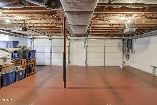 296 Redstone Dr, Bluff City, TN 37618 - garage featuring a garage door opener