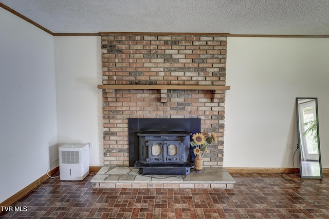 296 Redstone Dr, Bluff City, TN 37618 - detailed view of crown molding, a wood stove, a textured ceiling, and baseboards