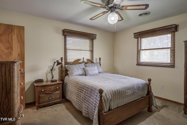 296 Redstone Dr, Bluff City, TN 37618 - bedroom with light carpet, baseboards, and a ceiling fan