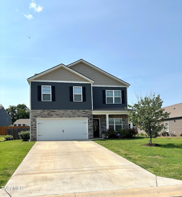 1058 Raccoon Ln, Piney Flats, TN 37686 - view of front of home with stone siding, an attached garage, and concrete driveway