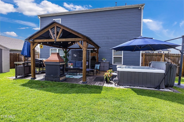 1058 Raccoon Ln, Piney Flats, TN 37686 - back of property featuring a hot tub, a gazebo, a patio area, and outdoor lounge area